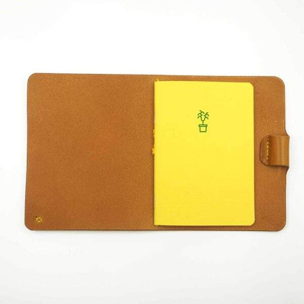 Nooto cover with Yellow refill adorned with icon